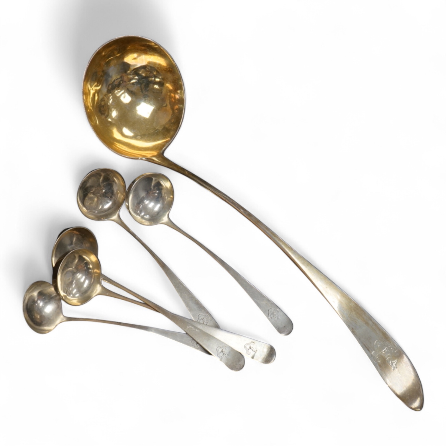 A set of four George III Scottish silver Old English pattern toddy ladles, James McKay, Edinburgh, 1809, 17.4cm, one other smaller Scottish silver ladle and a George III Scottish silver Celtic tip soup ladle, Francis How